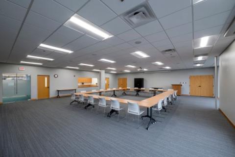 Large Meeting Room setup with tables and chairs
